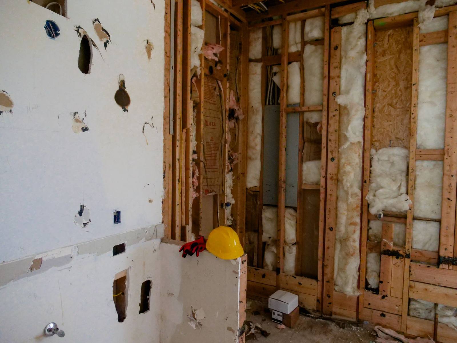 Wall opened to the studs to dry out after water damage